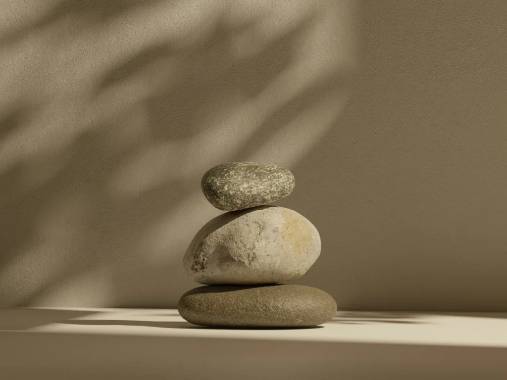 Website That Converts: 5 Reasons Why a Beautiful Website Alone Doesn’t Bring Clients 1 Stacked natural stones in perfect balance, a metaphor for the balance needed in a website that converts.